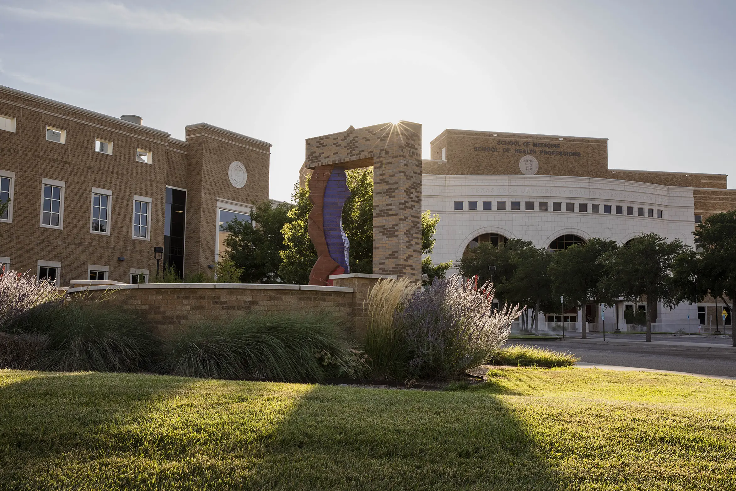 Sunset behind the amarillo campus buildings